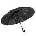 Large-sized three-fold umbrella with wooden curved handle, a business gift umbrella

